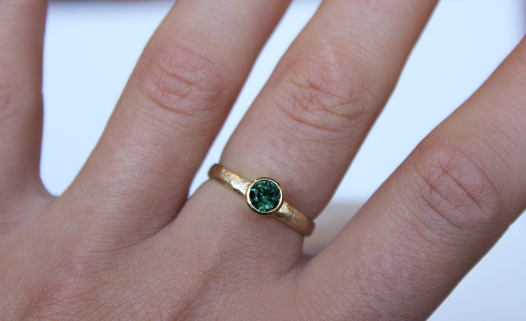 Australian sapphire ring with textured band.